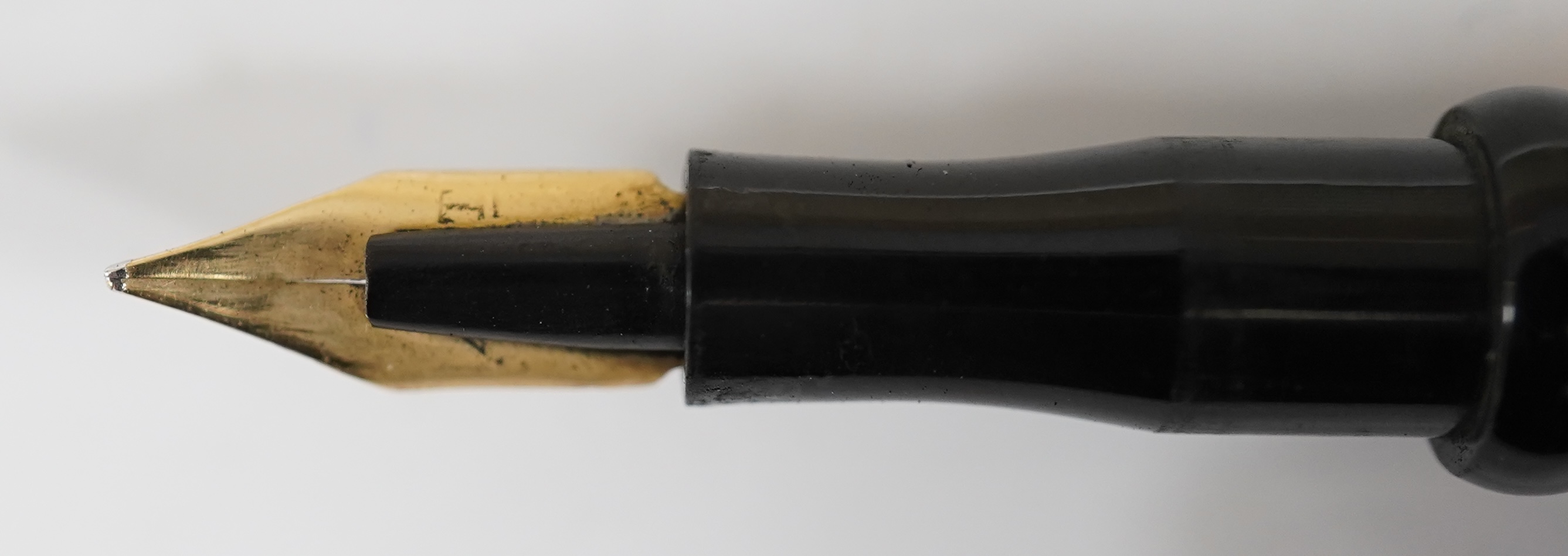 A high relief gold filled Eyedropper, with over and under feed and 14ct. gold nib